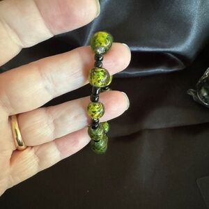 Murano Glass green bead bracelet gold spun with black beads